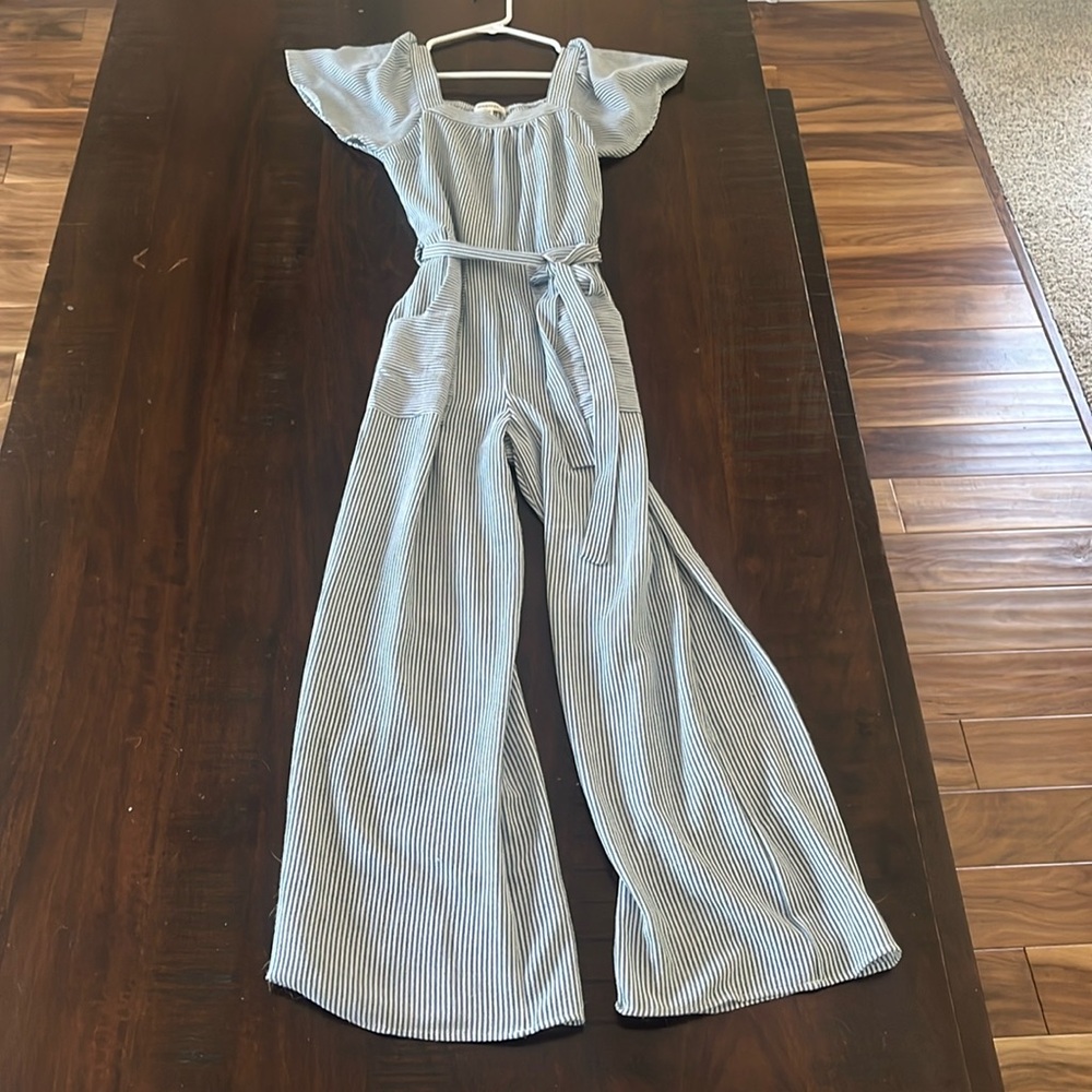 Blue and white pinstripe jumpsuit